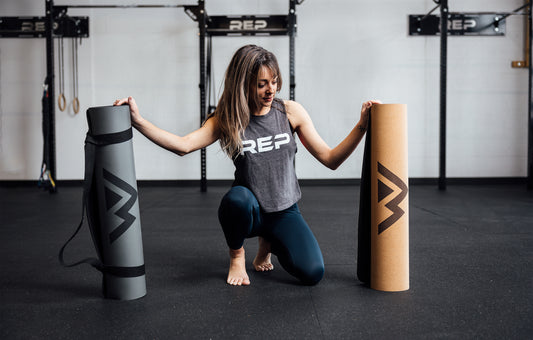 Woman doing yoga on a REP yoga mat