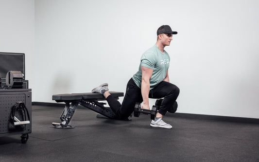 Athlete does a Bulgarian split squat.