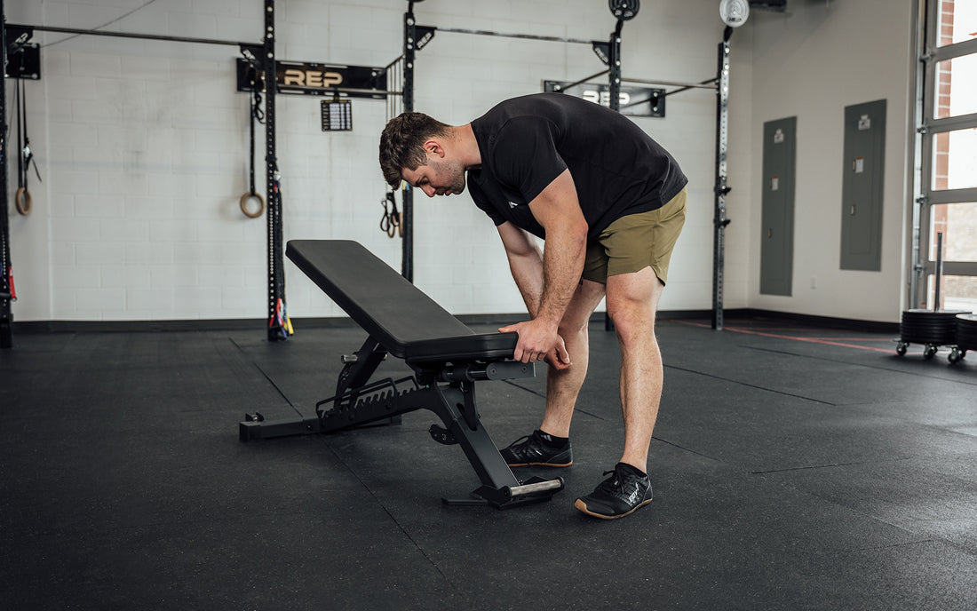 Man adjusting an incline bench