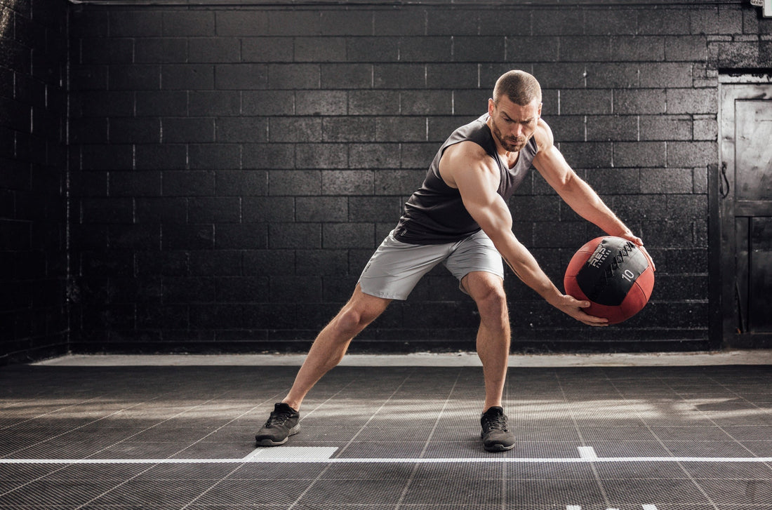 Athlete works with a REP® medicine ball.