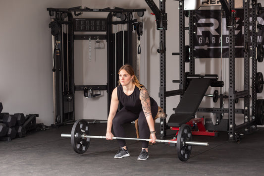 Woman bracing to deadlift