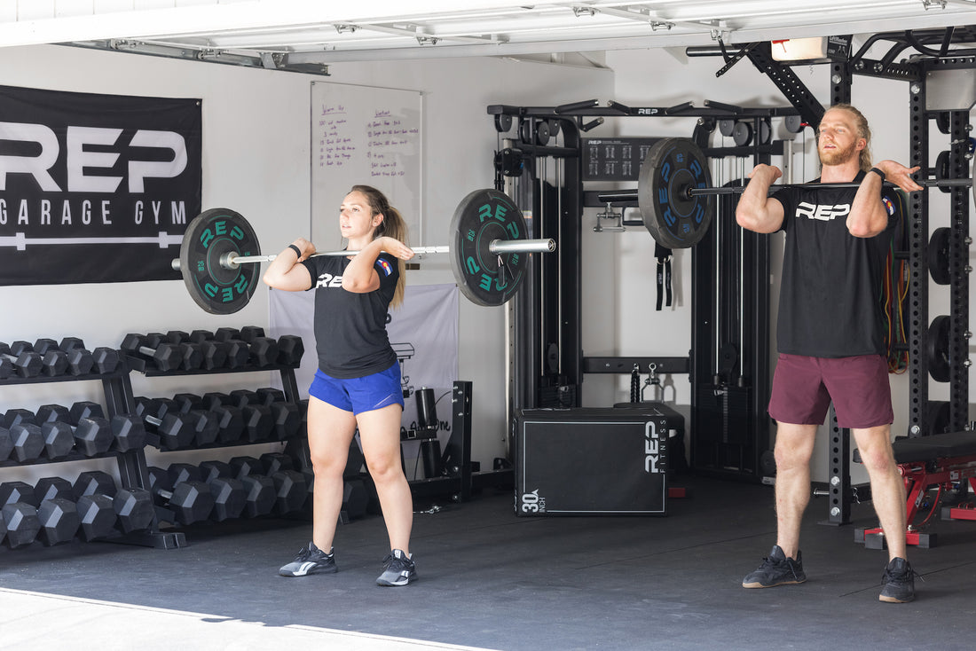 People lifting weights together