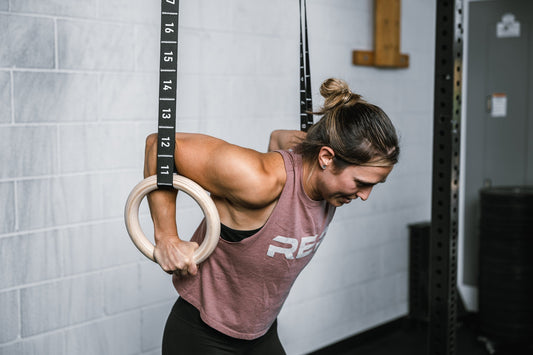 Athlete works on REP® Gymnastic Rings.