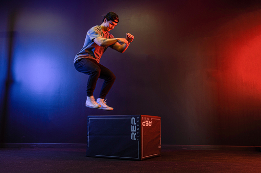 Lifter doing box jumps