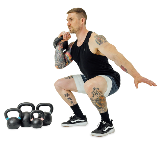 Man lifting with kilogram kettlebells