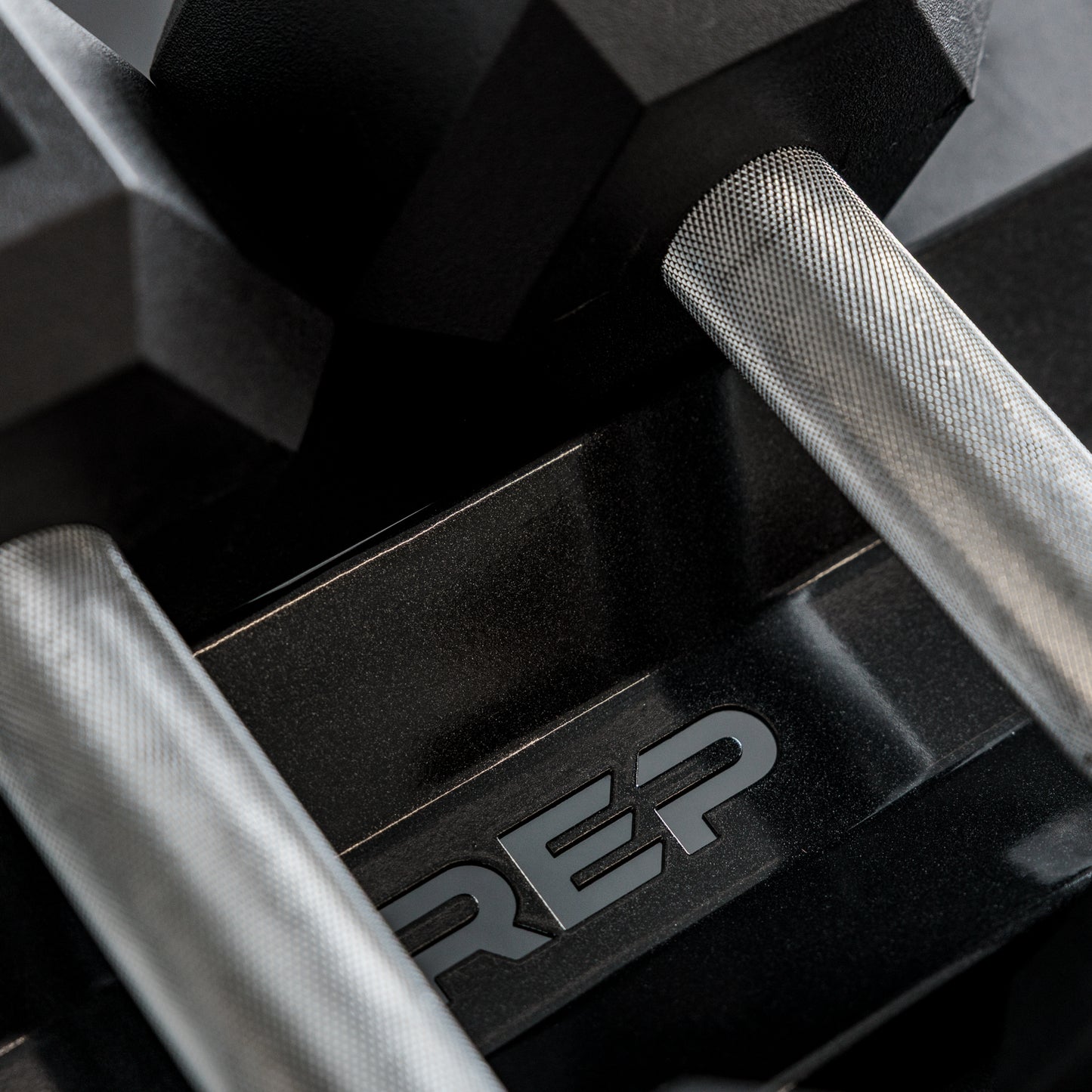 Close-up of the branding on the REP Fitness Commercial Dumbbell Rack