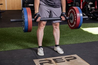 Athlete using the REP Fitness figure 8 lifting straps