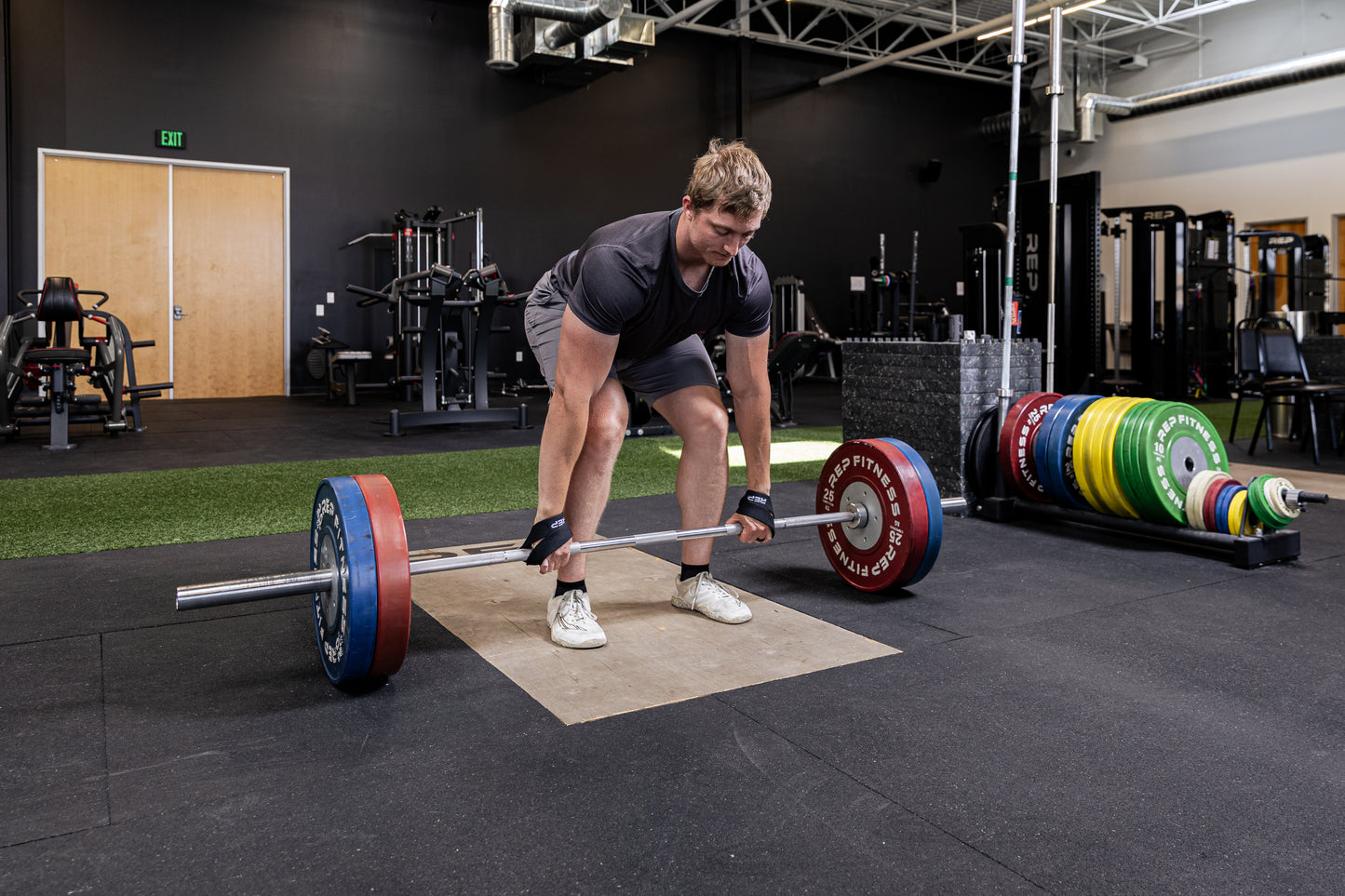 Athlete using the REP Fitness figure 8 lifting straps