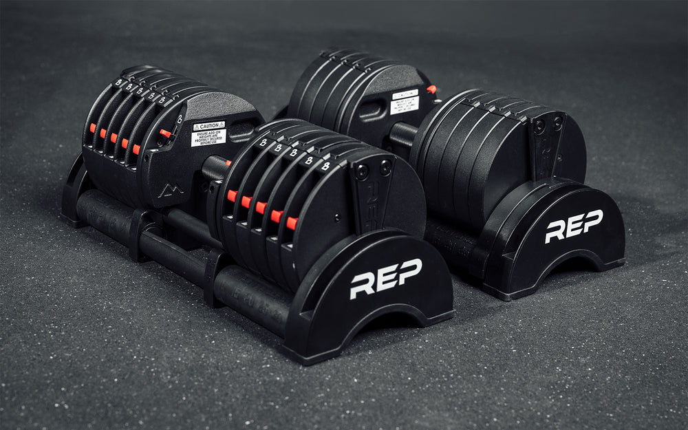 A pair of 30kg REP Fitness QuickDraw Adjustable Dumbbells (KG).