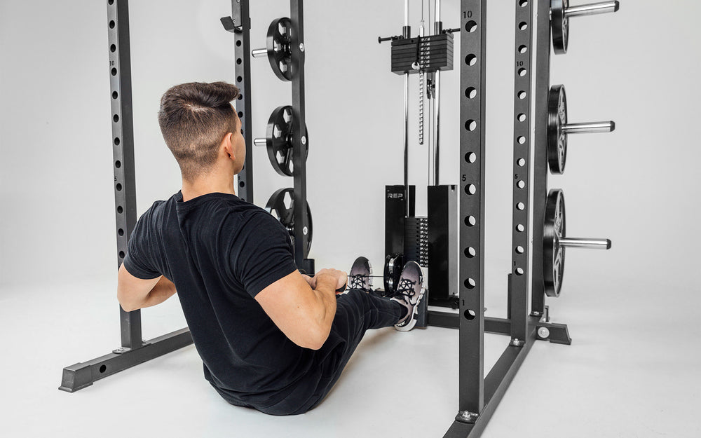 Selectorized Lat Pulldown and Low Row (1000 Series) Being Used For Low Rows