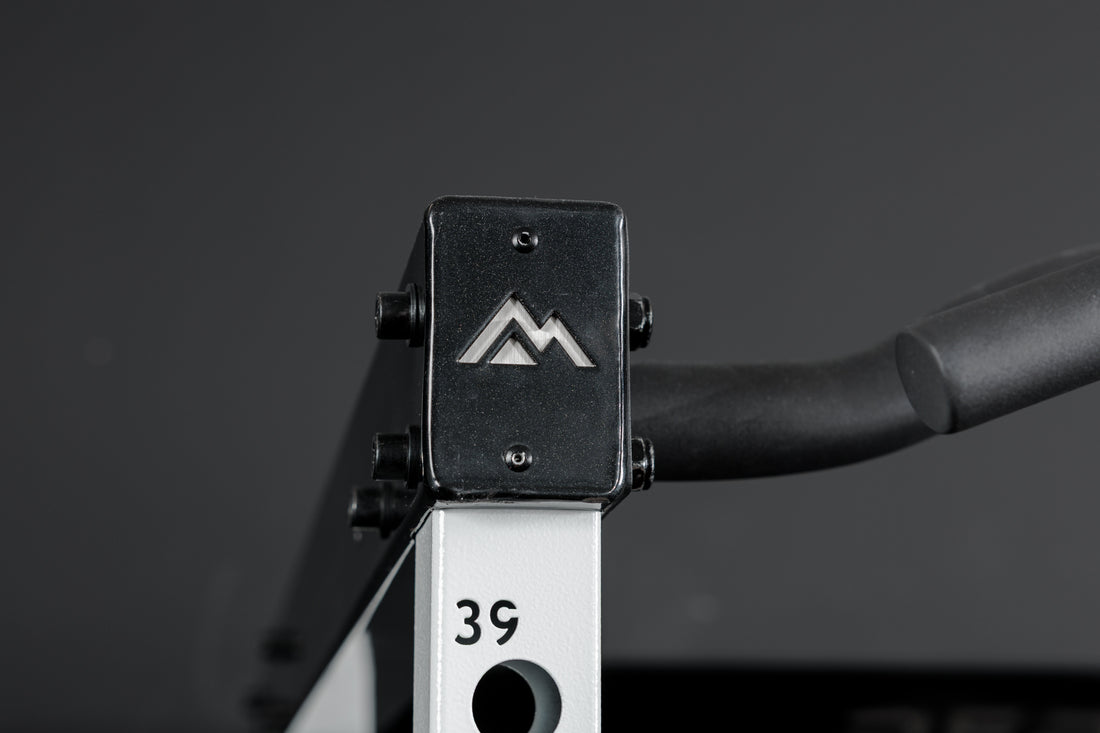 Close-up shot of the branded crossmembers on the REP Fitness Altitude™ Power Rack
