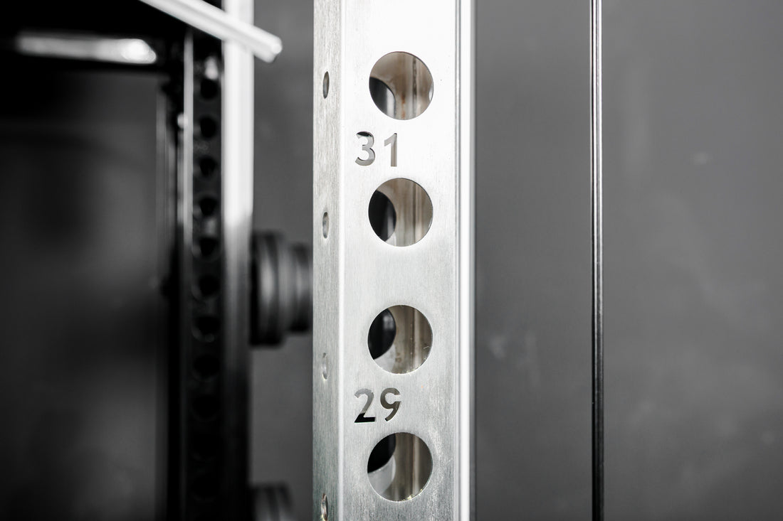 Close-up shot of the numbered rack uprights on the REP Fitness Altitude™ Power Rack