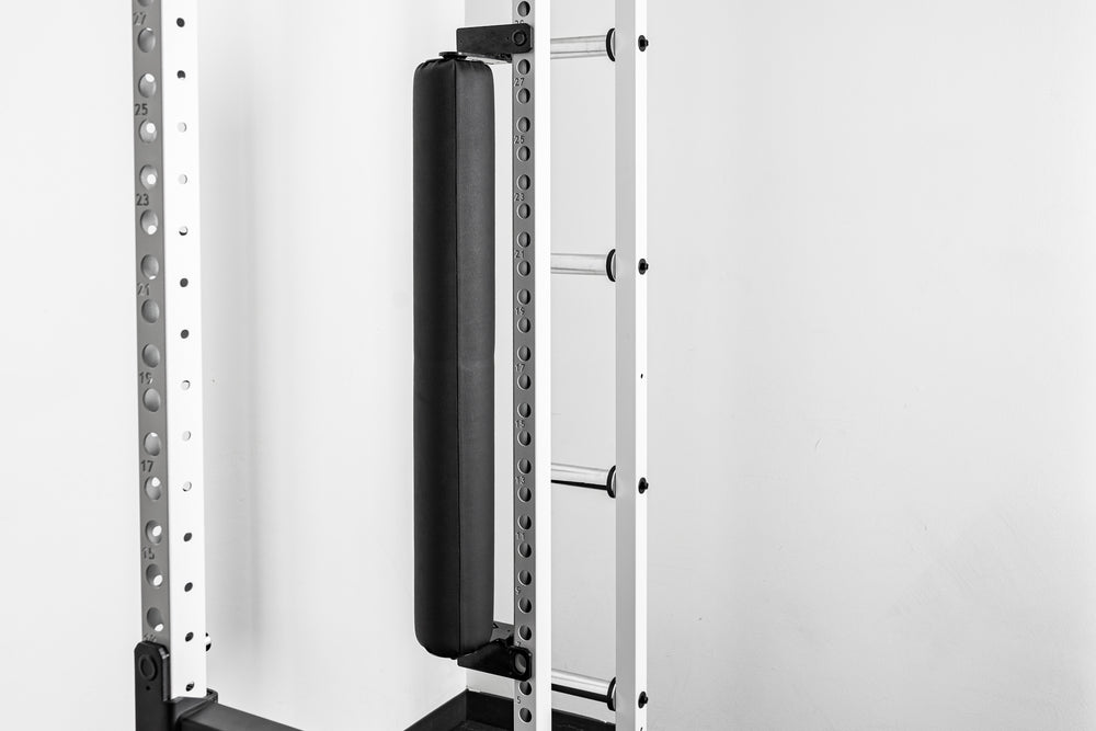 Rendering of the REP Fitness Altitude™ Leg Roller installed on the rack upright for vertical storage