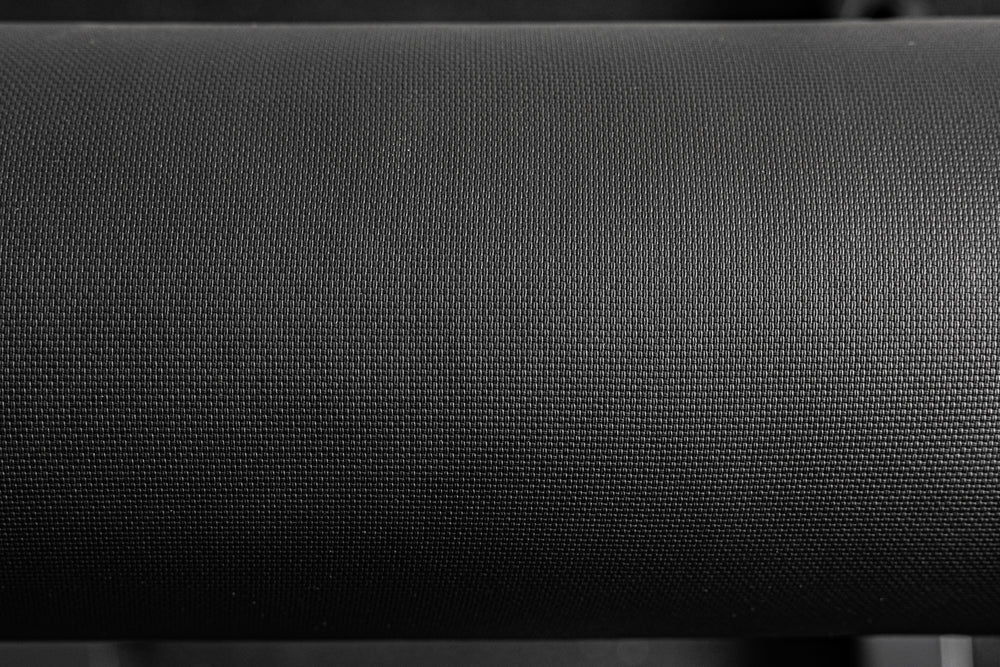 Close-up of the REP Fitness Altitude™ Leg Roller pad fabric