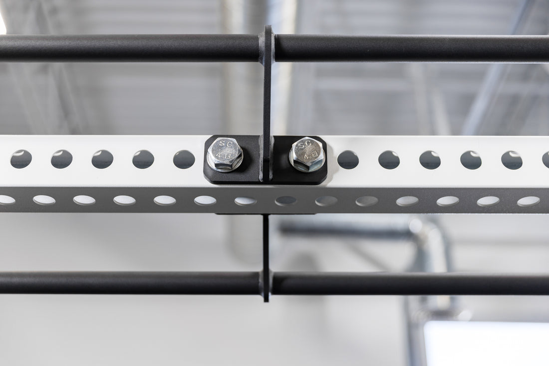 The REP Fitness Rack Crossmember Connectors with pull-up bars installed