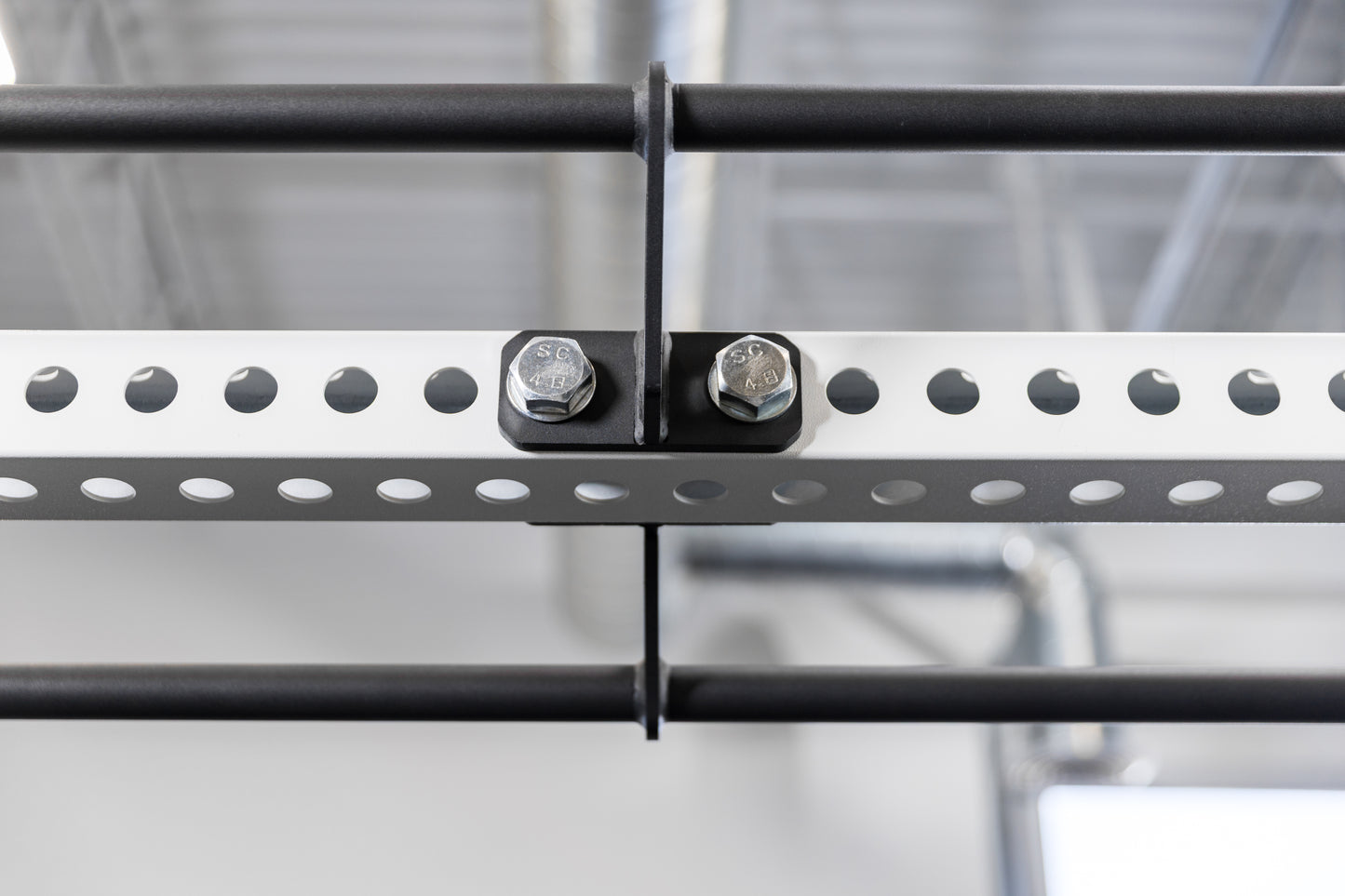 Close-up shot of the REP Fitness Double Pull-Up Bar's center bolts