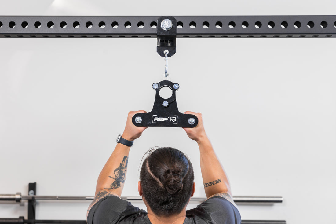 The REP Fitness Rack Crossmember Connectors with a shackle and close grip attachment installed