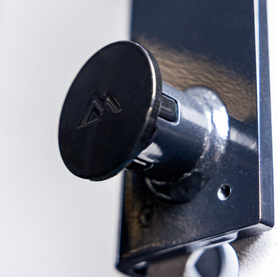 Close-up shot of the branding on the pop pin on the REP Fitness Flip-Down Safeties 2.0