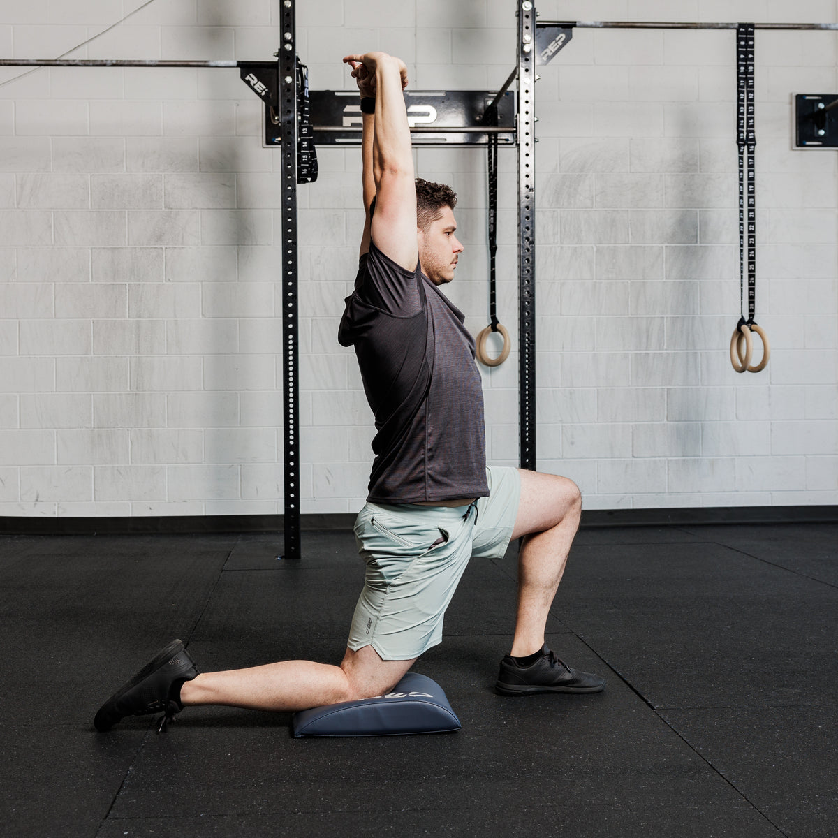 Athlete using the REP Fitness Ab Support Mat 2.0