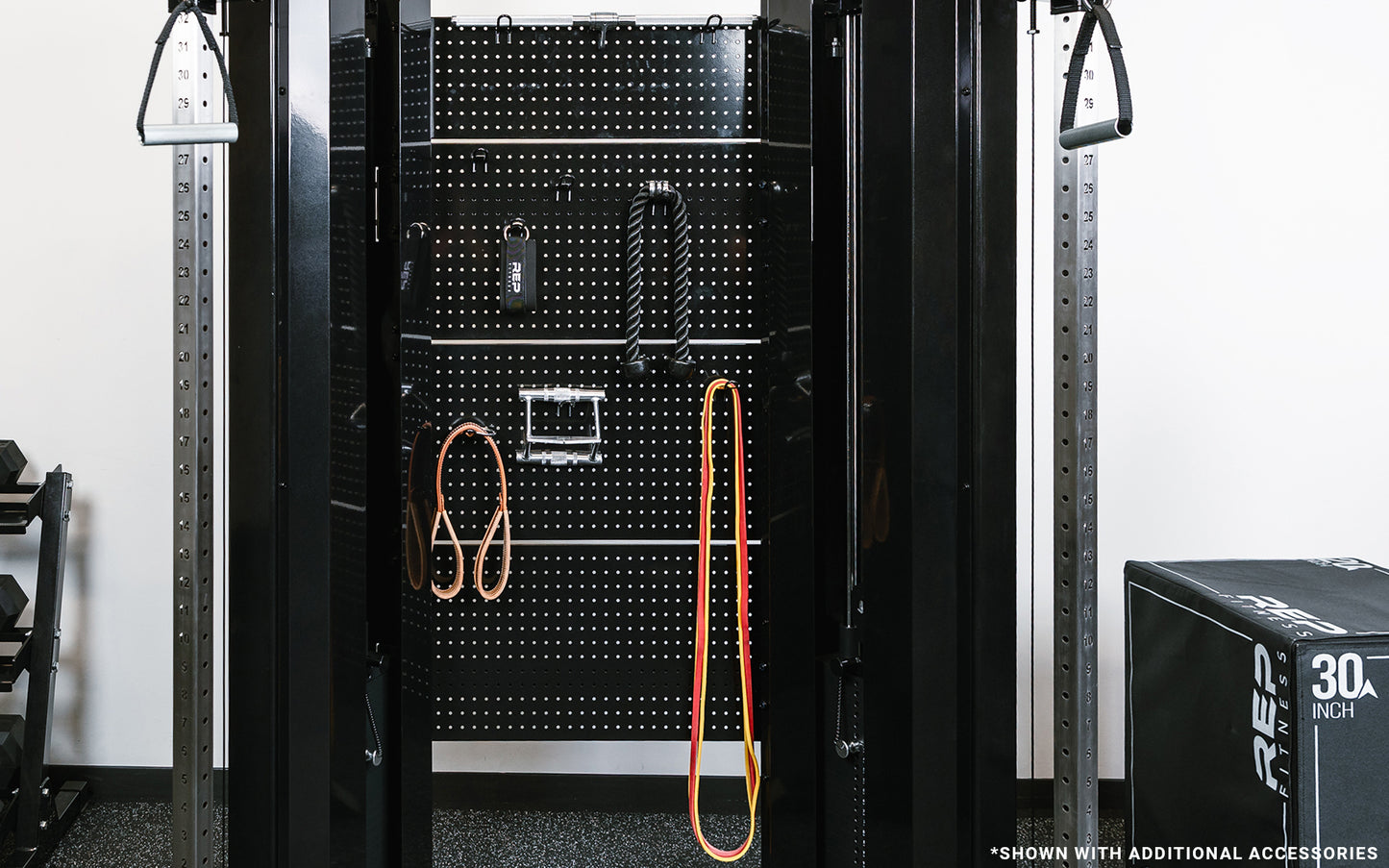 Image of multiple attachments hanging on the black pegboards of the black Arcadia™ max