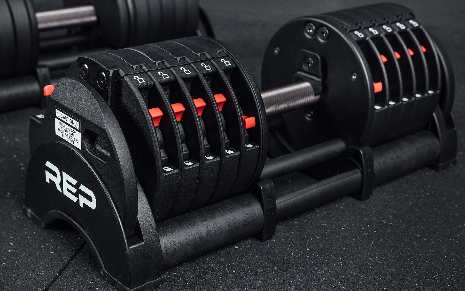QuickDraw™ Adjustable Dumbbell REP Fitness