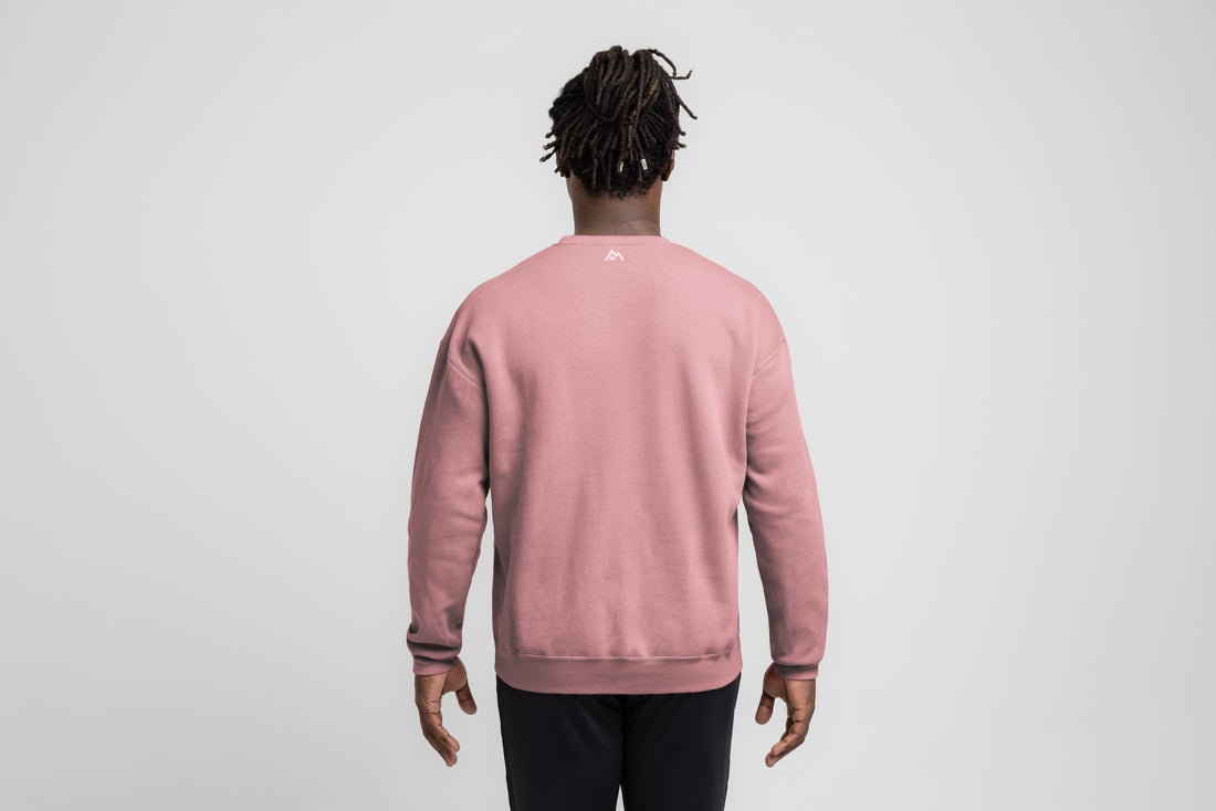 The REP Fitness Unisex Daily Driver Crewneck Sweatshirt in Dusty Mauve/White back, on model