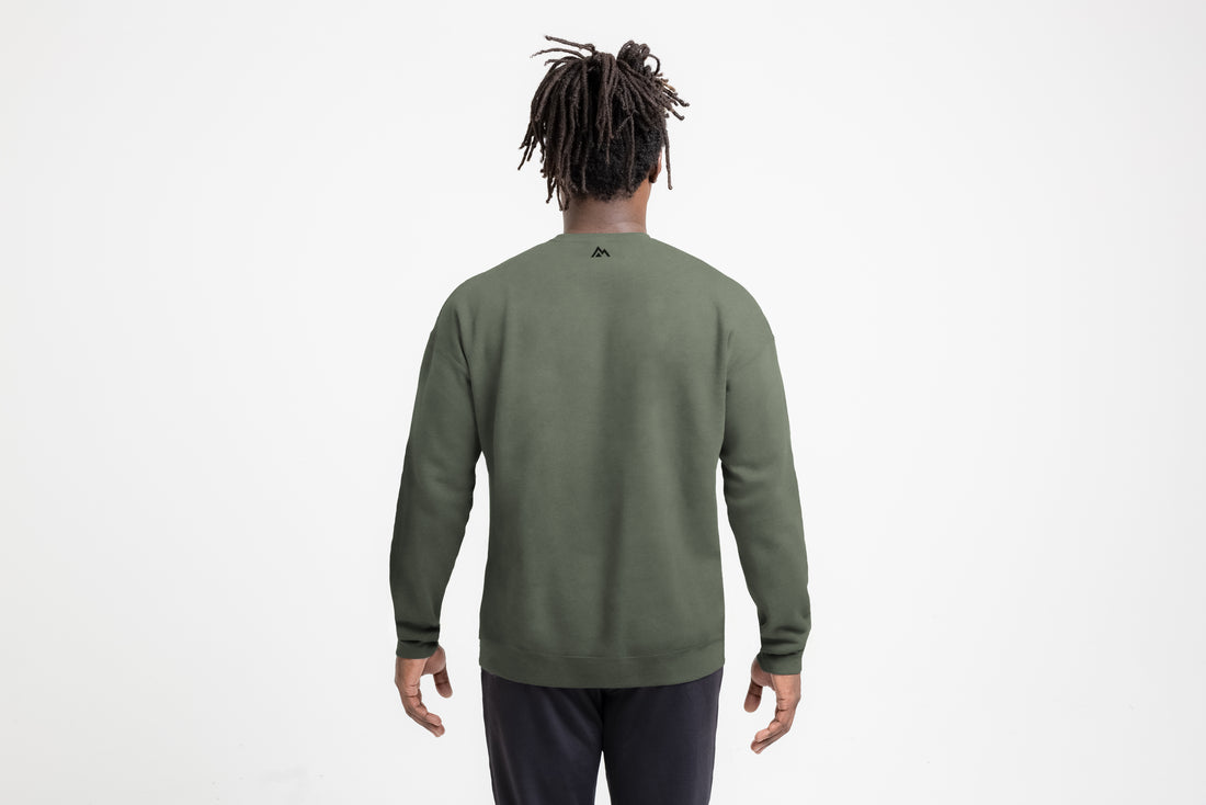The REP Fitness Unisex Daily Driver Crewneck Sweatshirt in Olive/Black back, on model