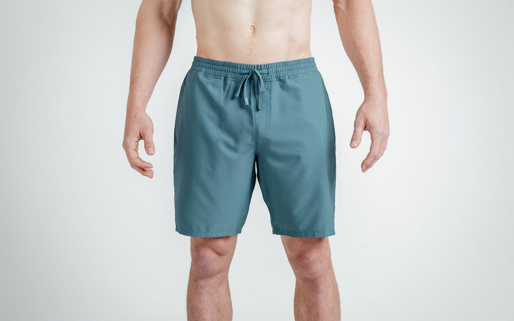 Athlete wearing slate Men's Motus Shorts