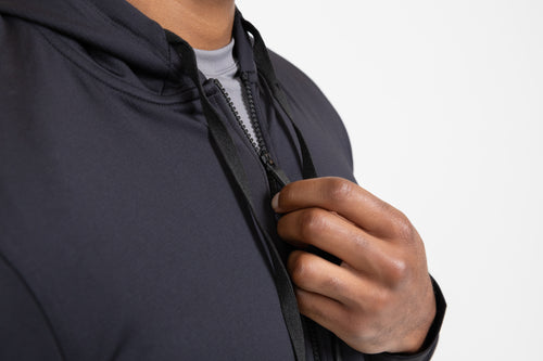 Close up of the zipper on the heather black Attis Jacket