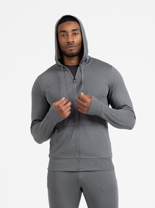 Person in heather cool gray Attis Jacket