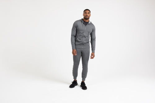 Person in heather cool gray Attis Jacket