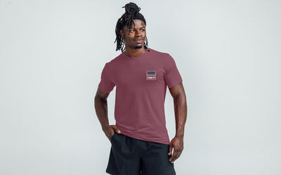 Athlete wearing the REP Fitness Rise Tri-Blend Crew T-Shirt in Heather Maroon/Blue