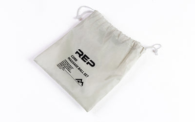 Studio-shot: REP Cork Massage Ball Set drawstring carrying bag.