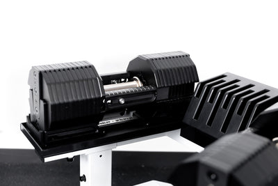 REP® x PÉPIN™ adjustable dumbbells on  a white REP® Adjustable Dumbbell Stand