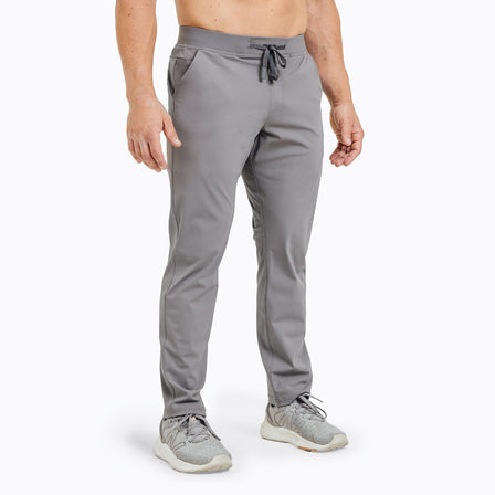 Front view of model wearing the cool gray REP Felix Pants.