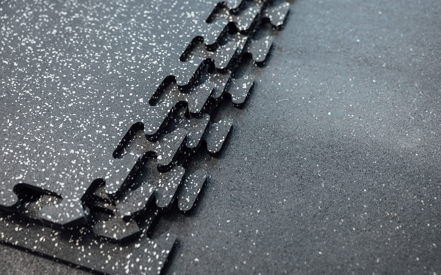 Grey Fleck Rubber Flooring Stacked Together