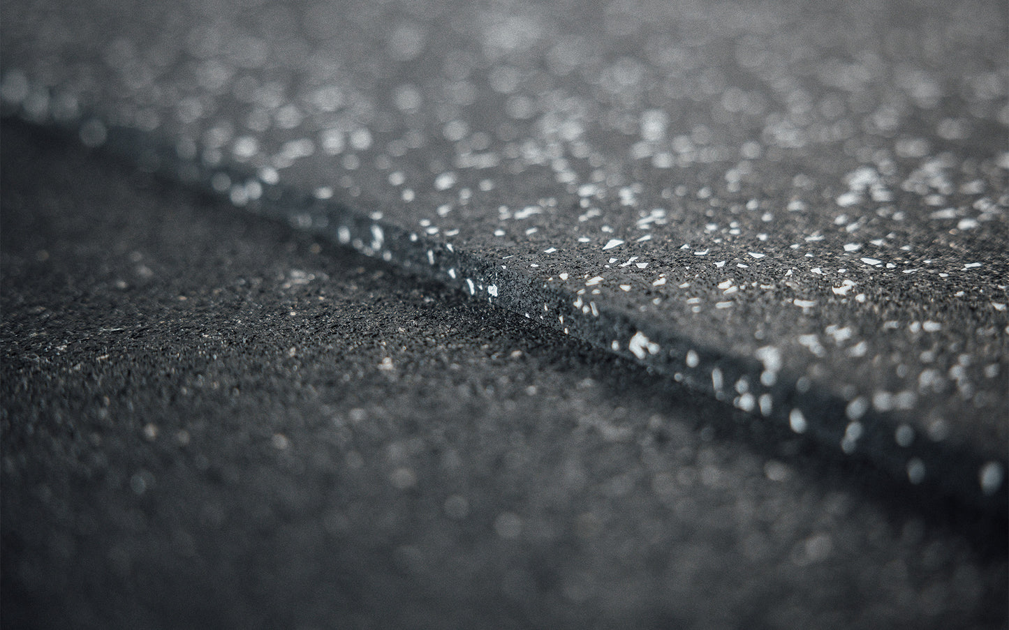 Close up of Grey Fleck Rubber Flooring