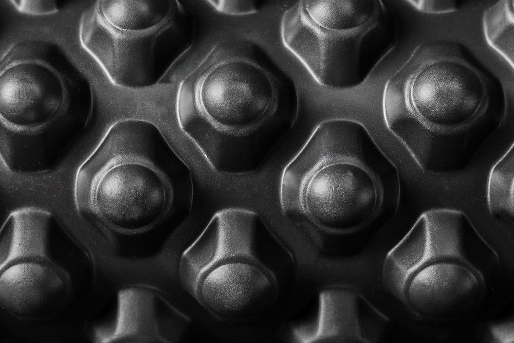 Close-up of Black "peak" texture on High Density Foam Roller 