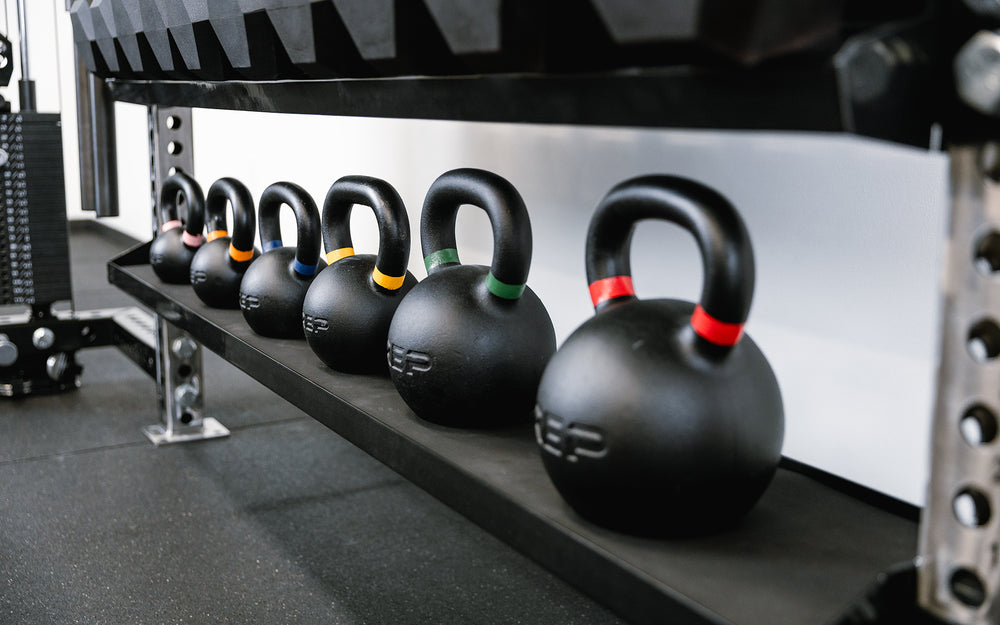 Dumbbell & Kettlebell Storage Shelf - Close up of Kettlebell Shelf side holding kettlebells