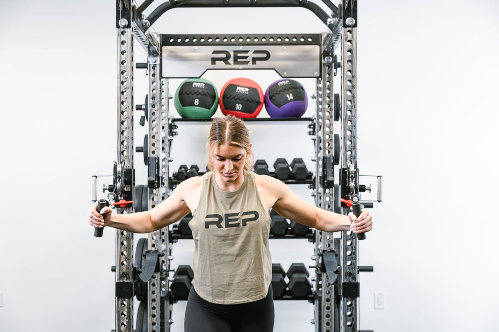 In-Rack Storage For the Athena Using Elbow Brackets Off the Back Of the Rack, Dumbbell Storage Shelves, and  Flat Storage Shelve. Storing dumbbells and medicine balls