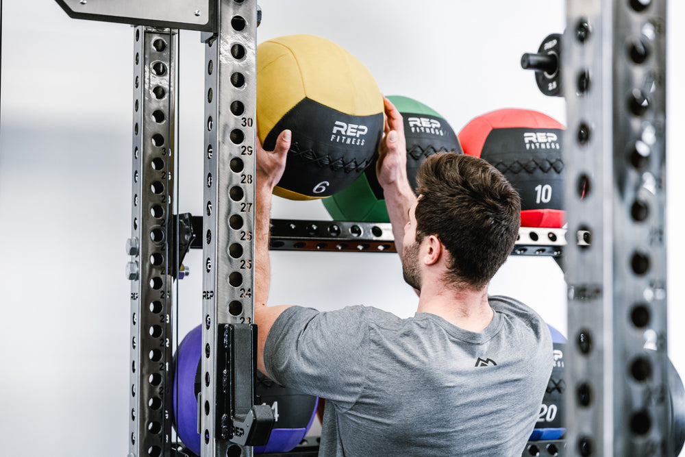 Placement of medicine ball onto Ball & Plate Storage Shelf