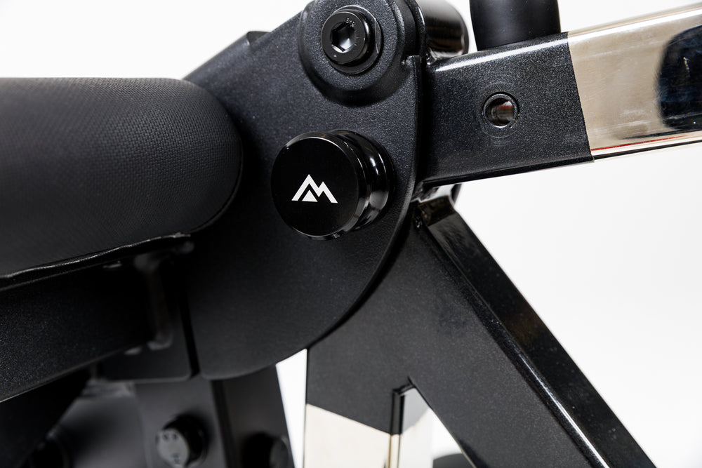 Close-up shot of the storage pin on the Leg Extension & Leg Curl Bench Attachment
