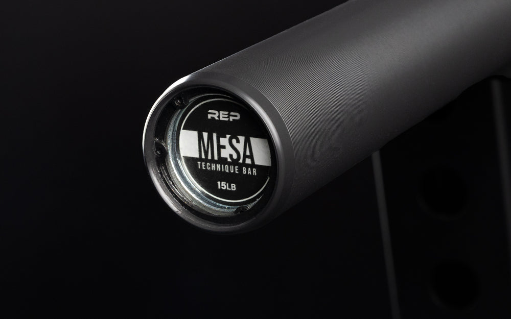 Close-up view of the REP Mesa Technique Bar end cap sticker.