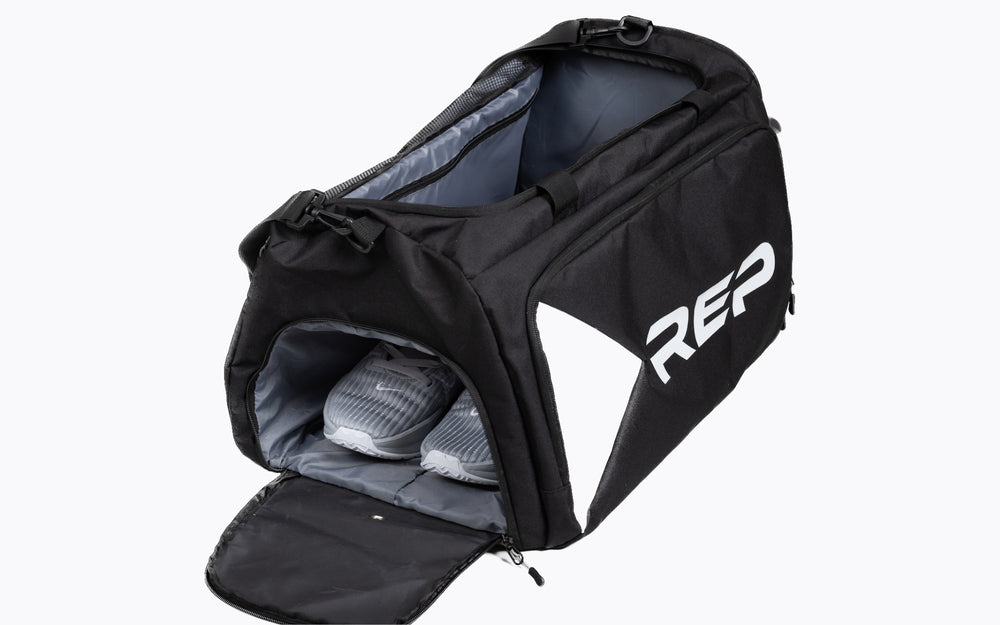 REP Gym Bag showing shoes in the zipped shoe compartment on the side