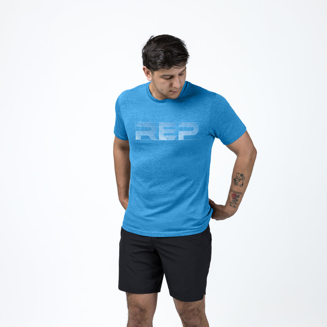 The REP Fitness Men's Blueprint Tri-Blend Crew T-shirt in Heather Royal/White front, on model