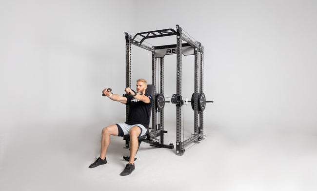 Athena Plate-Loaded Side-Mount Functional Trainer Dual Side Shown on Clear Coat PR-5000 Power Rack Being Used for Chest Press