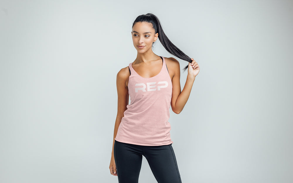 Woman wearing Heather Rose/White Daily Driver Tri-Blend Tank