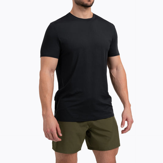 Men's Tees- Athlete wearing a black REP Men's Delta Tee on a gray background.