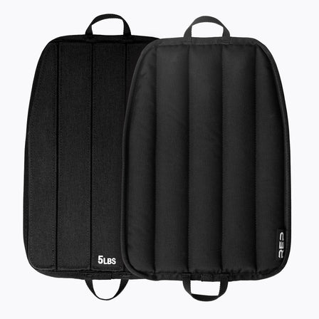 Black soft weight vest plates with '5 lbs' marking on a white background