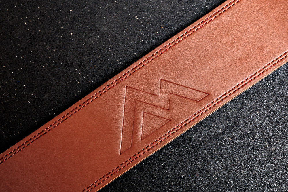Top-down view of the brown REP Leather Lifting Belt: 4 inches wide and made of genuine leather